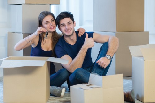 Movers beginning a safe removal job with equipment