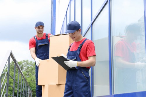 Moving truck and boxes for house removals across Richmond upon Thames