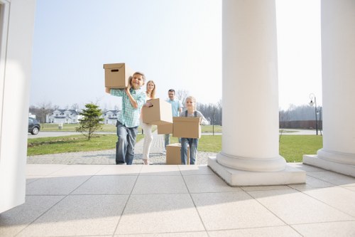 Movers protecting furniture during a safe house removal in Richmond Upon Thames