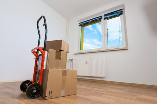 Careful moving of bulky furniture through a Richmond property