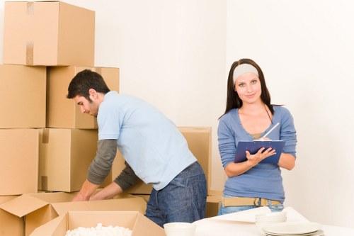 Packed boxes and furniture ready for urgent removal in a Richmond property